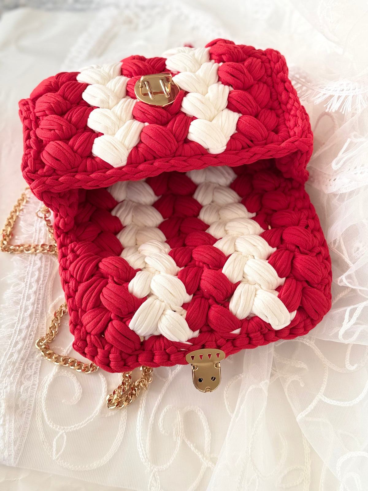 Red handwoven mini bag with silver chain strap