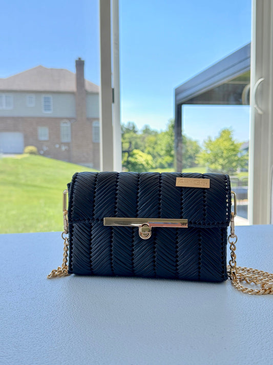 Black handwoven mini clutch with gold chain strap