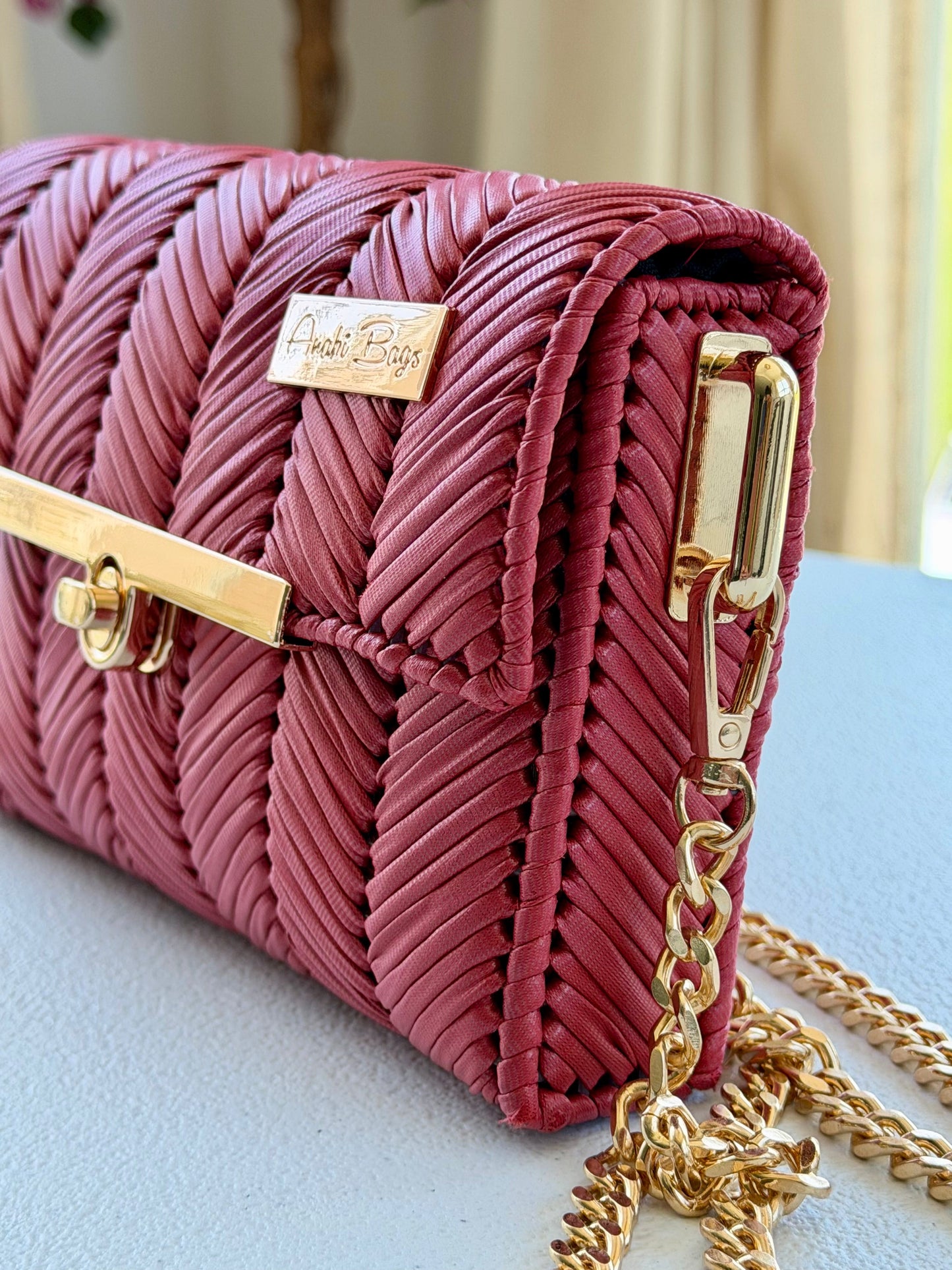 Red handwoven mini clutch with gold chain strap