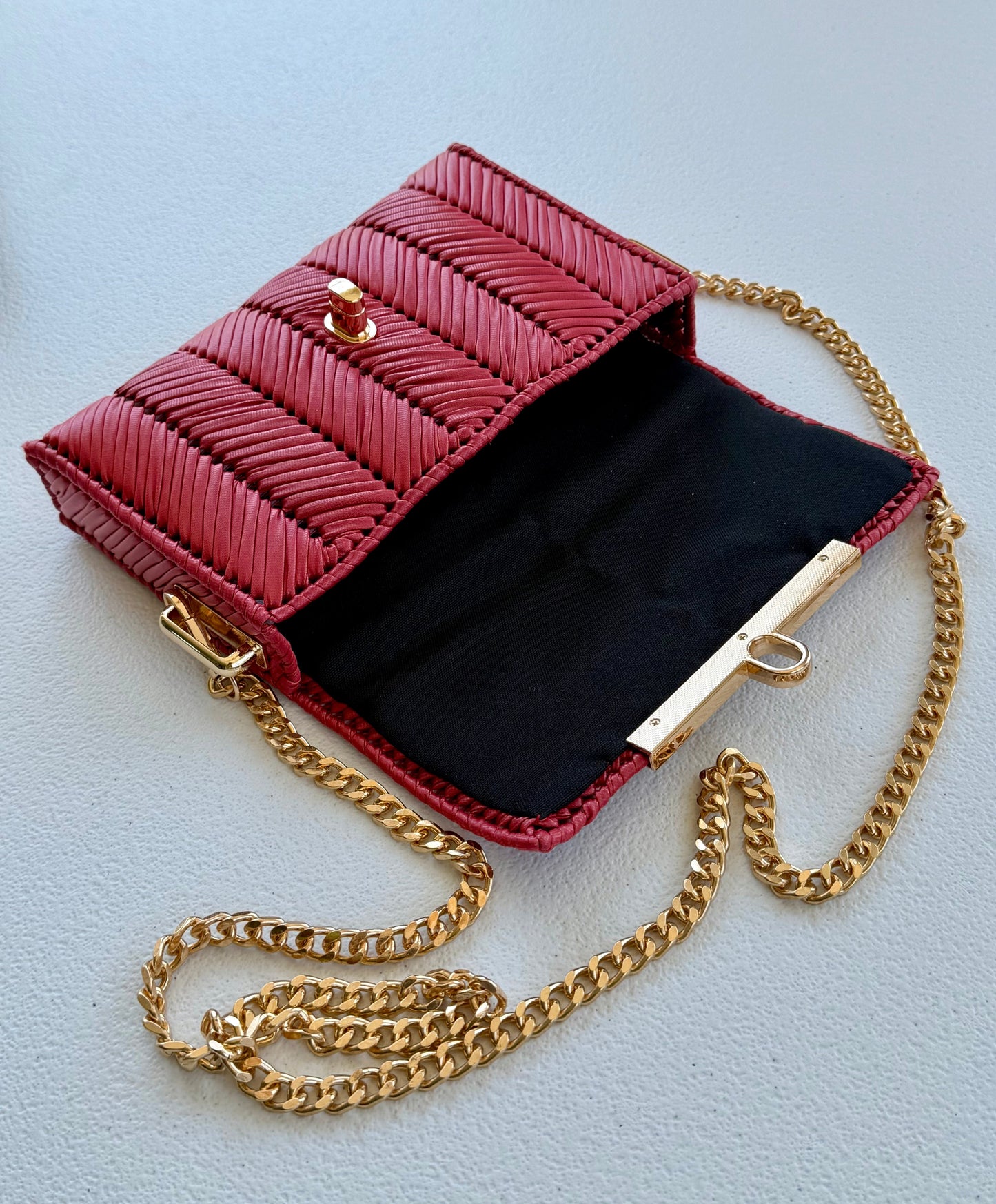 Red handwoven mini clutch with gold chain strap